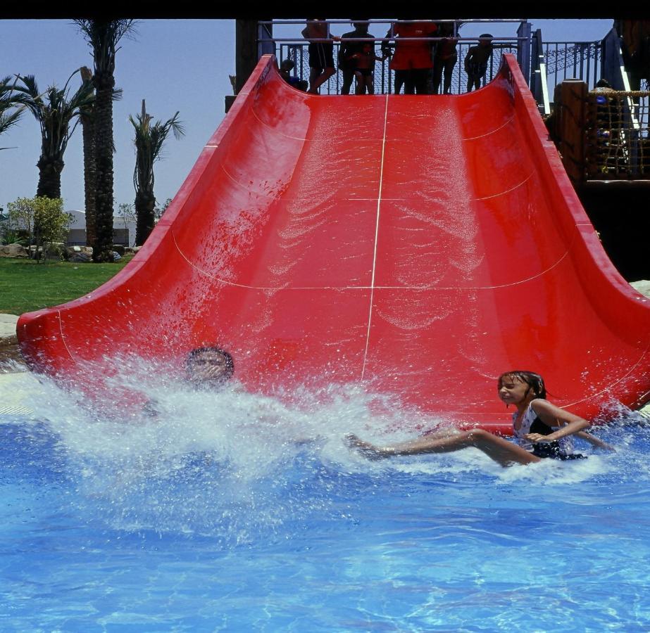 Sharm Dreams Vacation Club - Aqua Park Hotel Exterior photo A water slide
