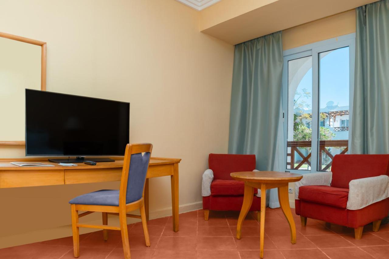 Sharm Dreams Vacation Club - Aqua Park Hotel Exterior photo A room at the hotel