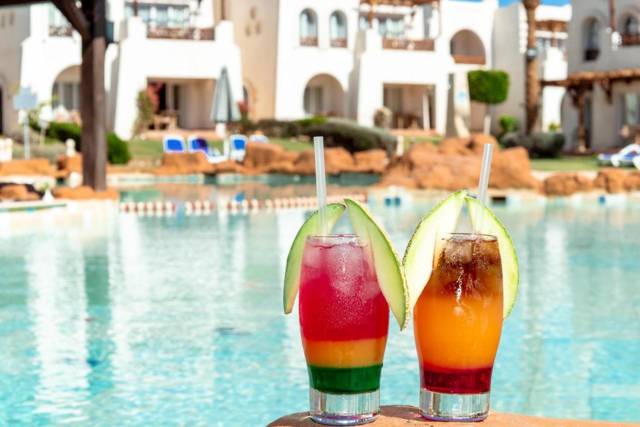 Sharm Dreams Vacation Club - Aqua Park Hotel Exterior photo Cocktails at the pool