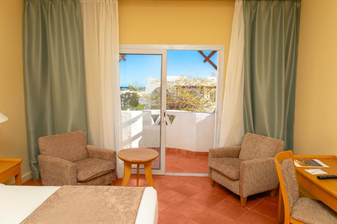 Sharm Dreams Vacation Club - Aqua Park Hotel Exterior photo A room at the hotel