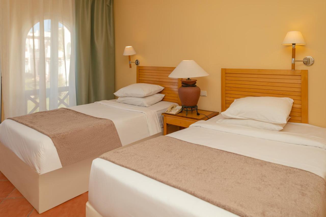 Sharm Dreams Vacation Club - Aqua Park Hotel Exterior photo A bedroom